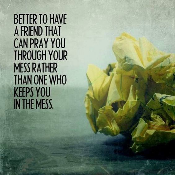 a bunch of yellow flowers sitting on top of a wooden table next to a quote a bunch of yellow flowers sitting on top of a wooden table next to a quote