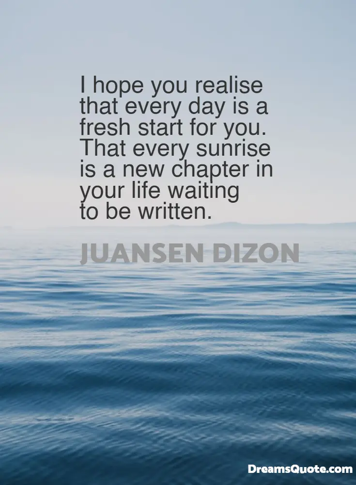 An inspirational quote about new beginnings overlaid on a calm, blue ocean backdrop with a soft horizon.